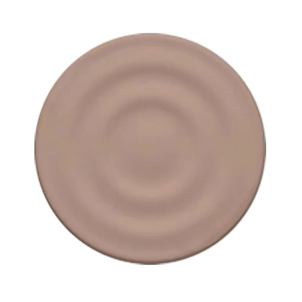A round, matte mauve silicone ripple grip magnetic phone stand.