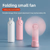Pink folding small fan in rabbit shape shown next to a white version and a close-up view