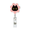 Pink flower shaped acrylic ID badge holder with a black cat charm and crocodile clip.