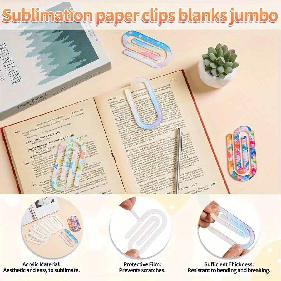 Jumbo acrylic paper clips in various colors and thicknesses shown next to a book and succulent plant.
