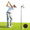 A golfer is using a magnetic golf monopod tripod to record a swing, with a smartphone attached.