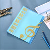 A light blue A4 multi-layer music score folder with a golden treble clef design on a gray surface.