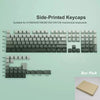 Paquete de keycaps impresas en los lados para teclados mecánicos, mostrando varios tamaños y colores.
