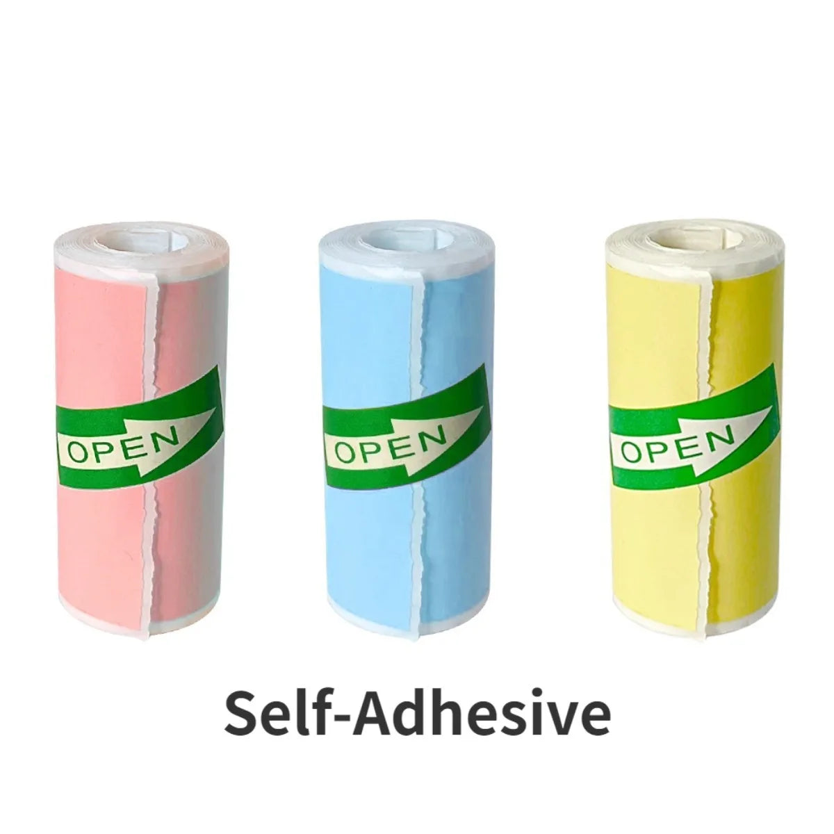 Drei Rollen selbstklebendes Thermopapier in rosa, blau und gelb.