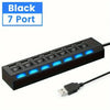 Schwarzer 7-Port-USB-Hub mit blauen Leuchten und einem USB-Kabel.