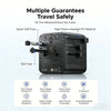 A black universal travel adapter featuring multiple safety guarantees including surge, overload, and short circuit protection
