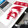 A red and white anime gaming mouse pad with a dragon design is shown next to a laptop.