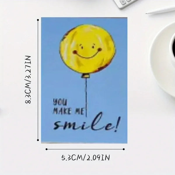 A yellow balloon with a smiling face is shown on a blue background with the text You make me smile!