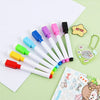 A set of eight colored dry erase markers with magnetic erasers displayed on a light green background.