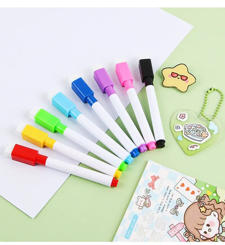 A set of eight colored dry erase markers with magnetic erasers displayed on a light green background.