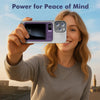 A woman holds a purple magnetic wireless power bank with a digital display and multiple charging pads.