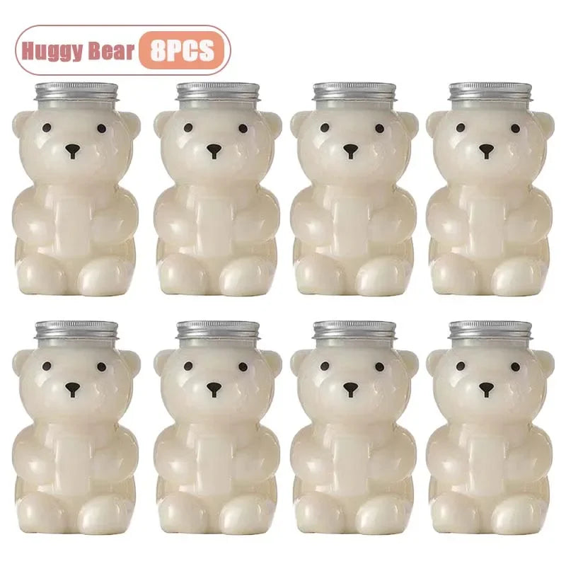 Eight pieces of white bear-shaped reusable water bottles with silver lids.