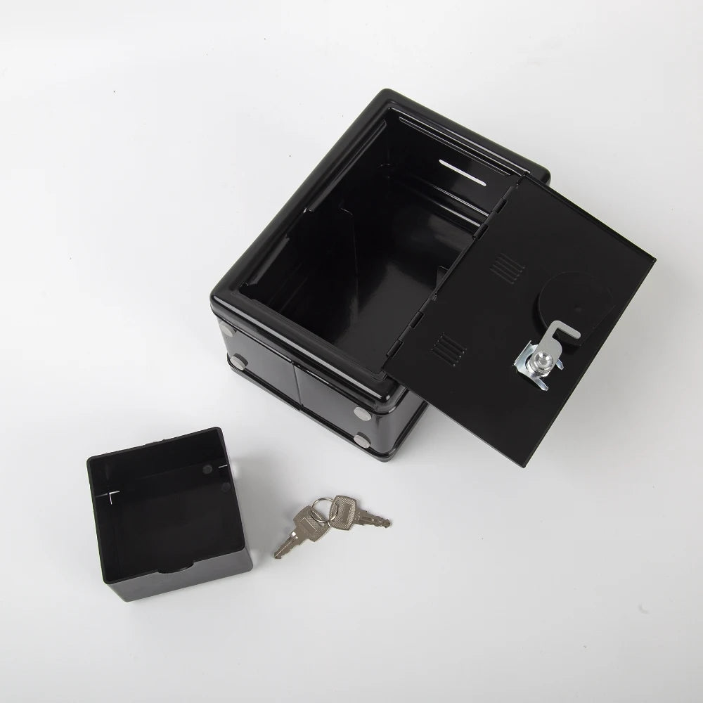 A black compact home safe box with an open lid showing a combo lock and keys.