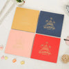 A set of three rectangular birthday greeting cards in yellow, blue, and red with gold foil designs.