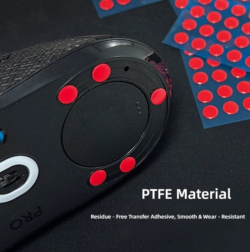 Close-up of a black gaming mouse featuring red adhesive dots and PTFE material for smooth gliding