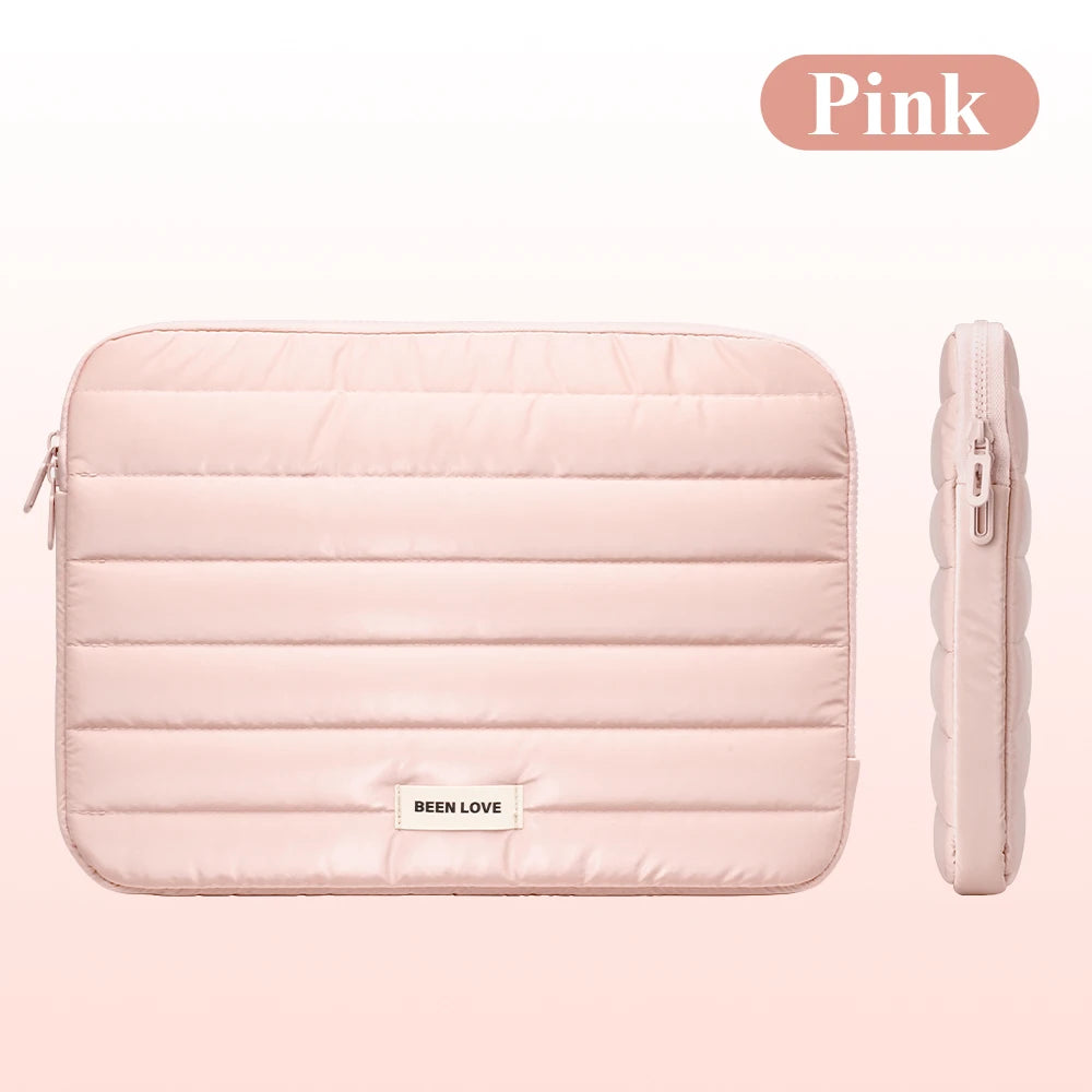 Pink padded laptop sleeve for MacBook, iPad, and tablet with a zipper closure.