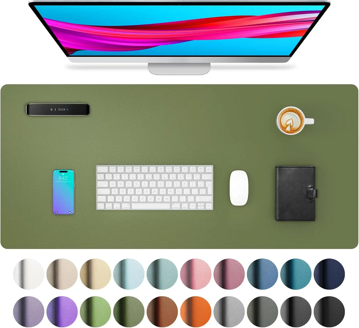 A large green desk mat featuring various color swatches and a computer monitor, keyboard, mouse, and smartphone.