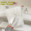 A clear packet containing 40 cards and 10 pages for photo sleeves or binder collection