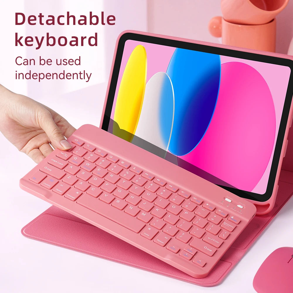 A pink detachable keyboard is shown resting on a matching pink protective case next to a tablet.