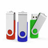 A silver metal USB flash drive with a red and blue casing is shown next to a green plastic housing.