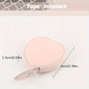 A pink PU leather heart-shaped measuring tape is shown with its dimensions marked.