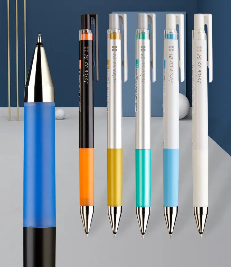 A set of Pilot Juice Up fine point gel pens in various colors including blue, orange, yellow, teal, and white.