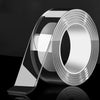 Roll of heavy duty clear double-sided gap tape viewed from the side with a glossy reflection.