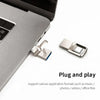 A silver USB 3.2 Type-C flash drive is shown next to a laptop, illustrating a plug and play connection.