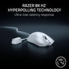 White Razer Viper V3 Pro wireless gaming mouse shown on a dark surface.