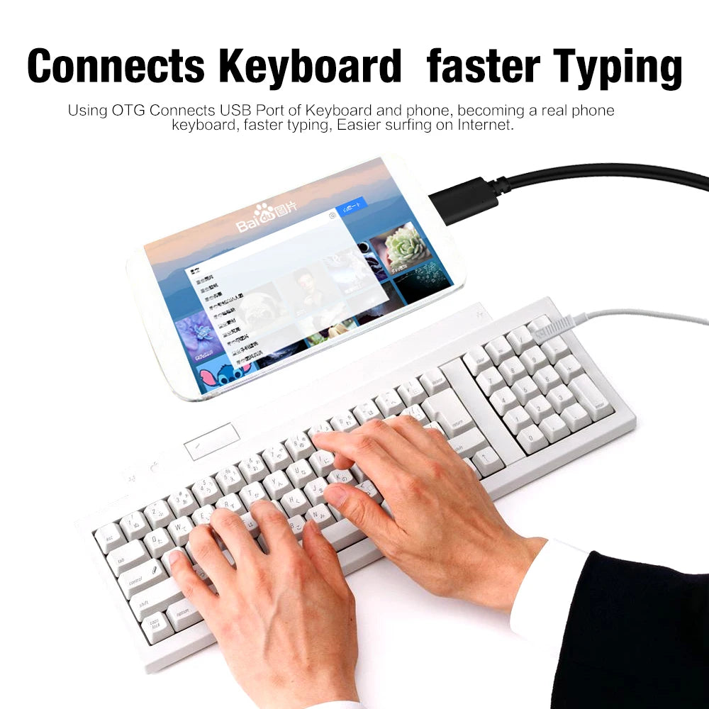 A hand is using a keyboard connected to a tablet via an OTG adapter for faster typing.