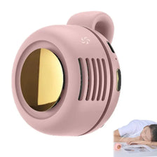 Ventilador eléctrico portátil mini sin cuchilla rosa con rejilla circular y un símbolo decorativo pequeño.