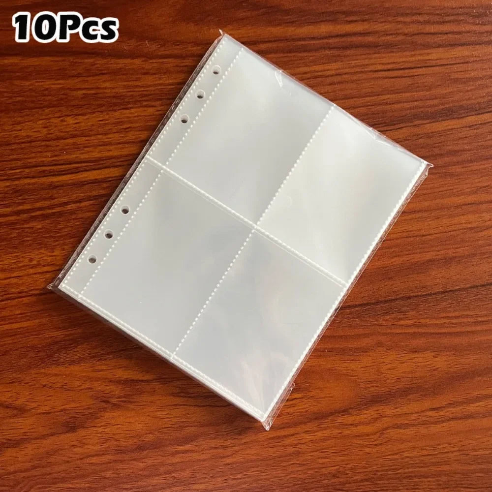 A pack of 10 clear transparent photo card binder sleeves laid on a wooden surface.