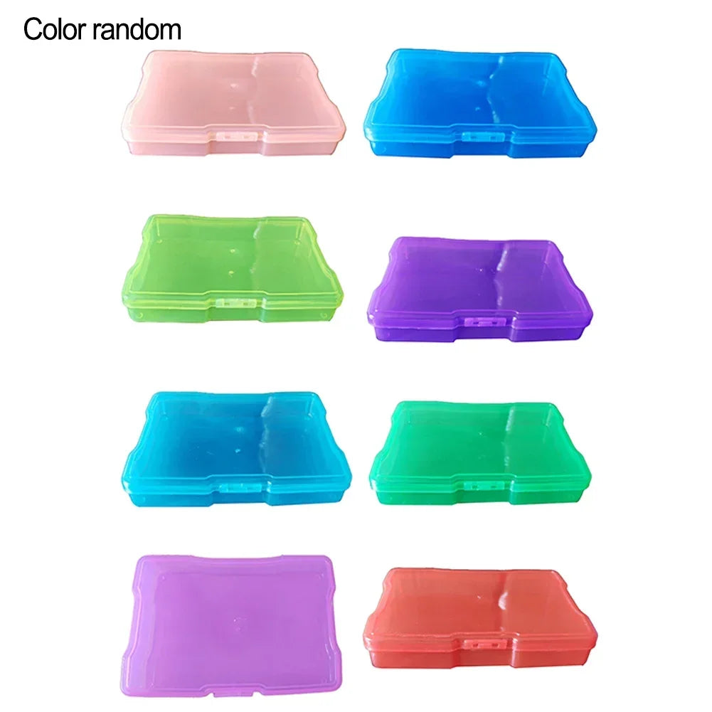 Fünf transparente Fotostaufboxen in verschiedenen Farben, darunter rosa, blau, grün, lila und orange.
