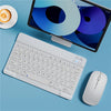 A white portable Bluetooth keyboard is shown next to an iPad displaying a blue and purple interface.
