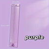 A purple portable manual paper cutter trimmer with dimensions 33cm by 6cm.