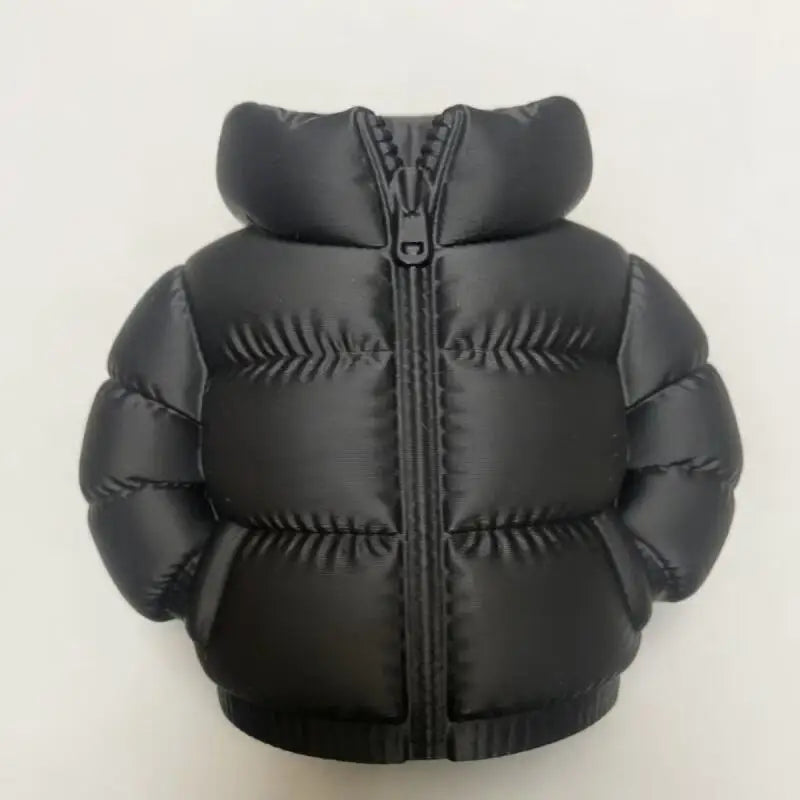 Black puffer jacket with a zipper and quilted texture.