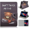 A dark gray leather folio case with a printed bear design and a clear window showing a tablet inside.