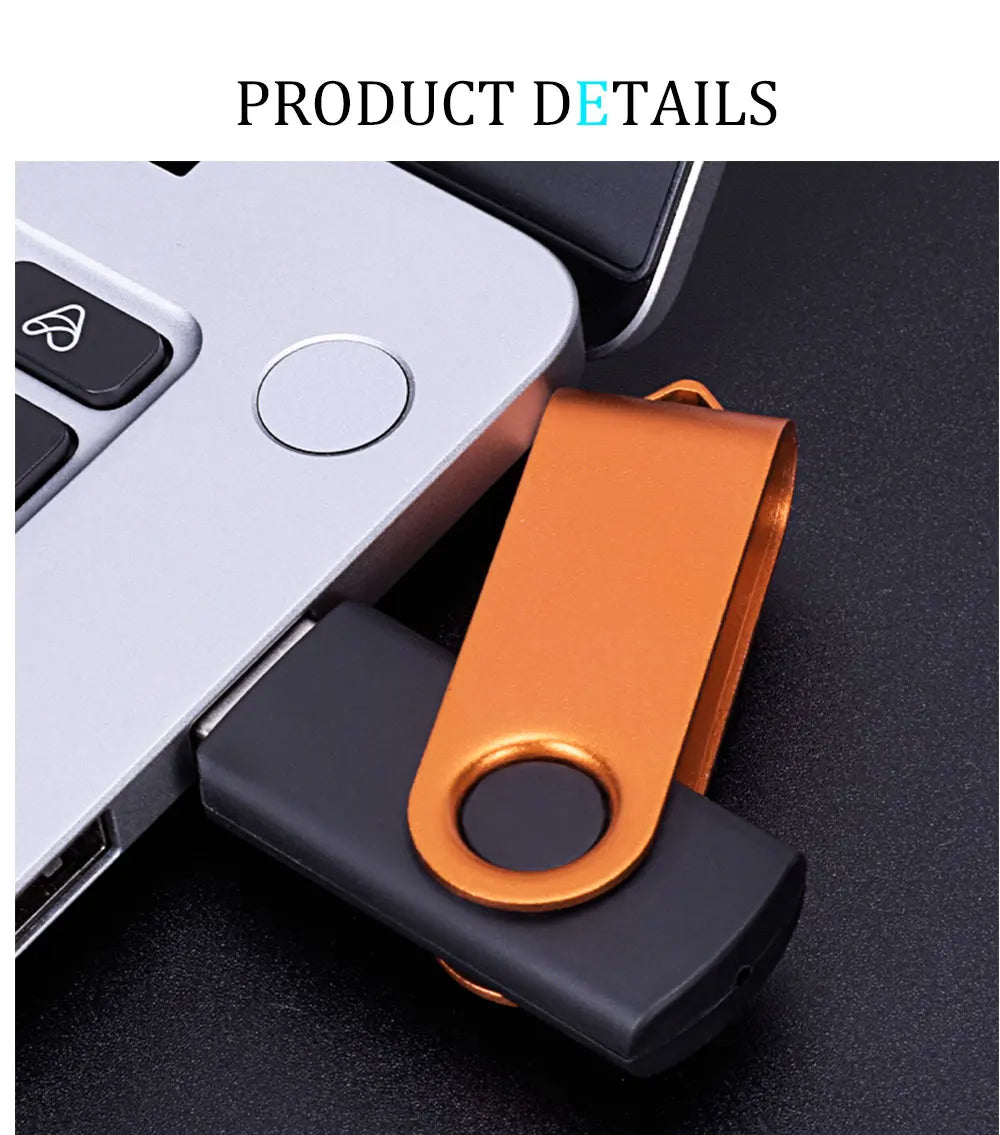 An orange USB flash drive is shown next to a white electronic device.