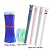 A set of four pink and white panda-themed gel pens with green and blue erasers and refills.