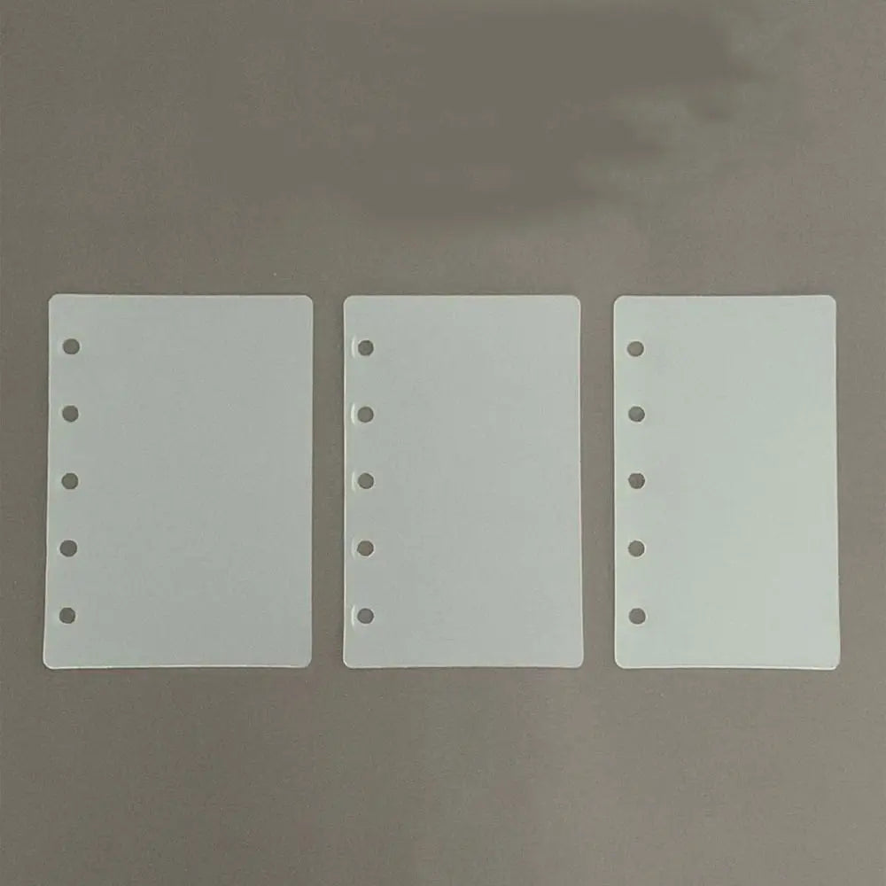 A set of ten transparent divider pages for M5 and A8 loose-leaf planners, showing blank white sheets with punched holes.
