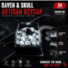Gothic Raven & Skull Artisan keycap in cherry mx resin shown on a keyboard.