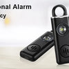 A black rechargeable personal alarm device is shown next to its charging cable and a diagram illustrating its 130dB sound lev
