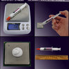 A syringe package of GD370-SY7-3 medical device with a needle and a ruler for scale.