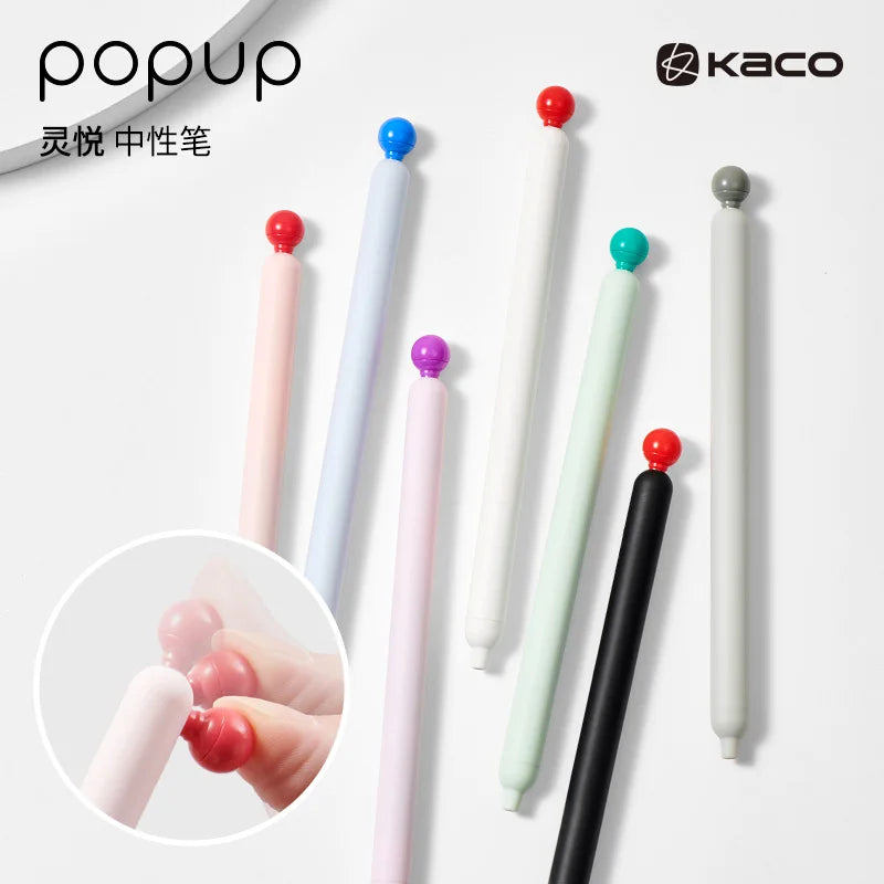 A collection of smooth gel pens in various colors, including pink, blue, purple, and black, shown vertically.