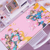 Pink and yellow anime-inspired XXL gaming mouse pad featuring characters in a dynamic pose