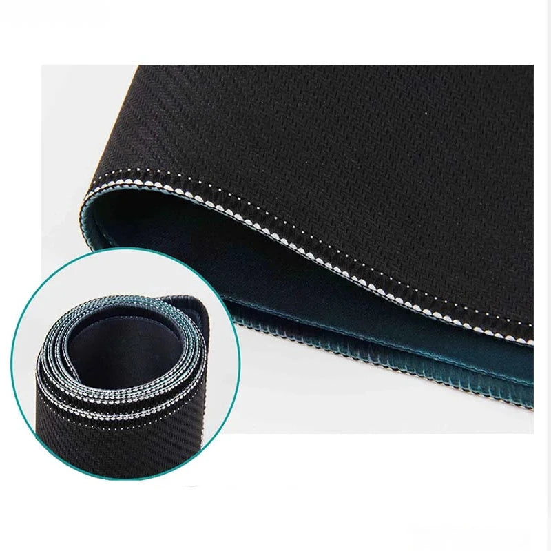 Black gaming mouse pad with stitched edge and a circular view of the textured fabric.
