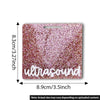 A rectangular, glittery pink acrylic badge holder with the word ultrasound engraved on it.