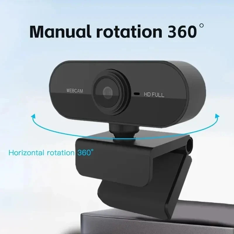 A black webcam mounted on a horizontal swivel base, demonstrating 360-degree manual rotation.
