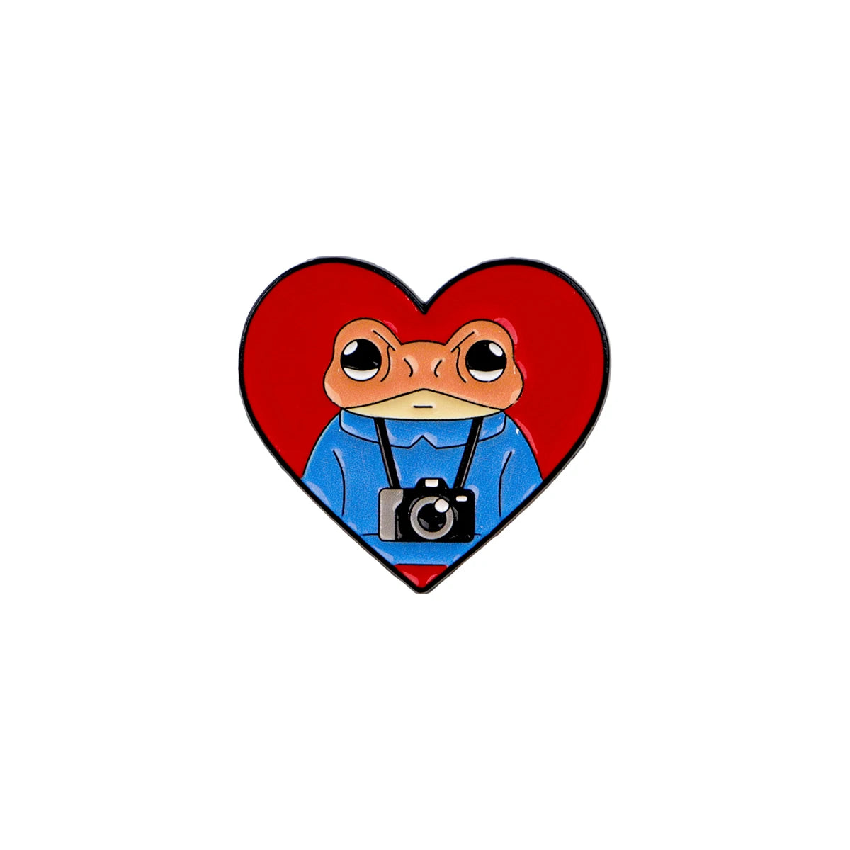 An enamel pin featuring a sarcastic frog face inside a red heart shape.