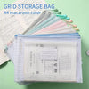A stack of colorful mesh storage bags and a white document pouch are displayed on a light green surface.